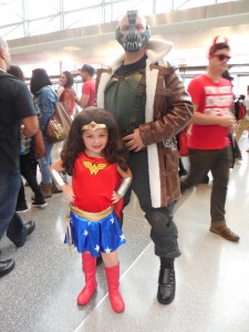 Father and daughter as Bane and Wonder Woman at New York Comic Con 2014